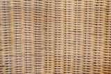 RATTAN THREE LEG LOUNGE CHAIR